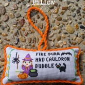 Adding a twisted thread to your cross stitch pillow.